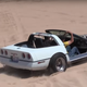 Illustration for article titled This Stripped Down C4 Corvette Annihilates The Sand Dunes